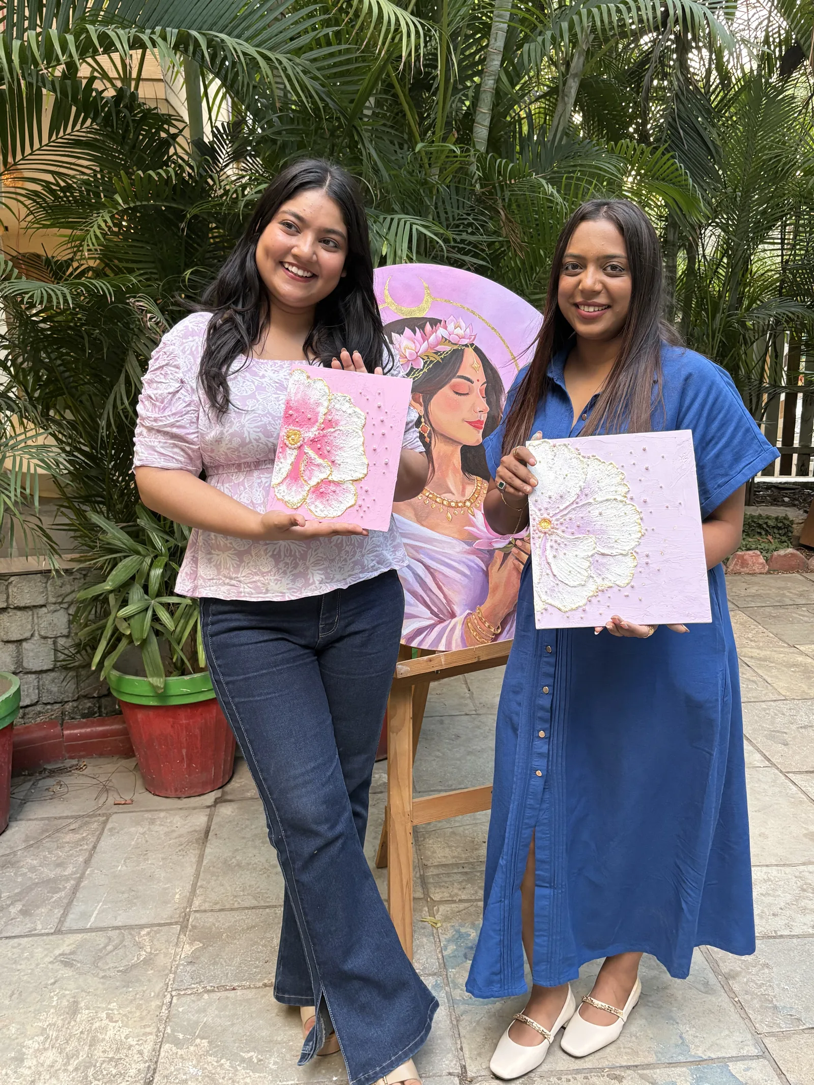 Two participants with their textured floral pieces